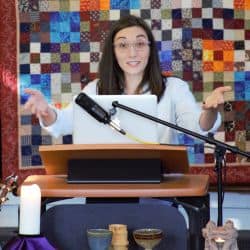 Melissa preaching, holding up hands, Jan. 26, 2020