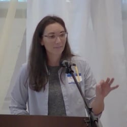 Melissa preaching, holding up one hand, making a point, Sept. 12, 2021