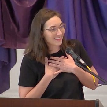 Melissa preaching at RMC on April 3, 2022
