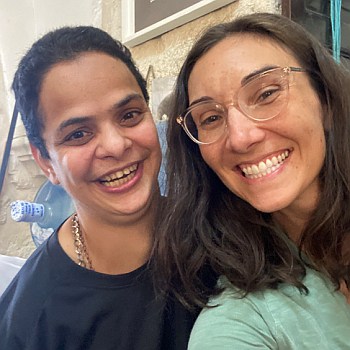Melissa and a friend in Palestine, both smiling broadly for this selfie.