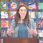 Raleigh Mennonite Church Melissa preaching, using her hands for expression, March 2, 2025.